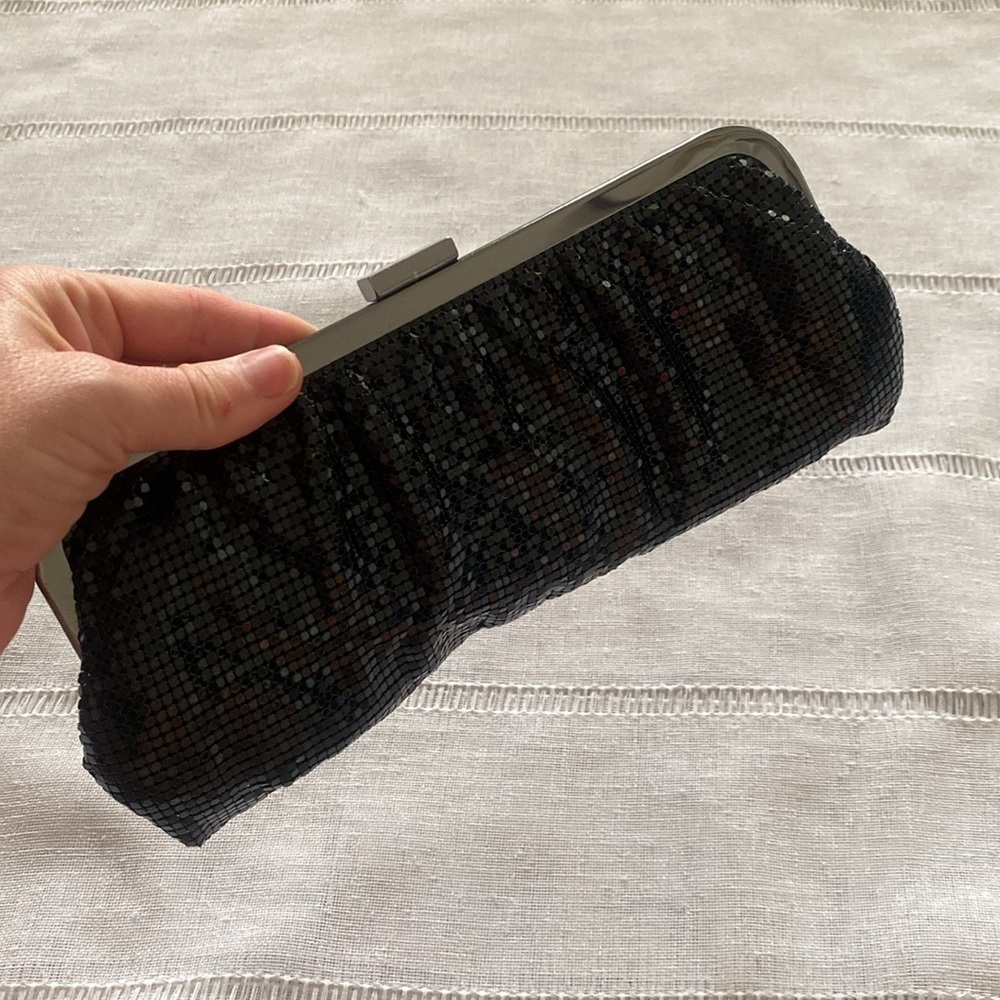 Express Y2K mesh evening clutch in black.